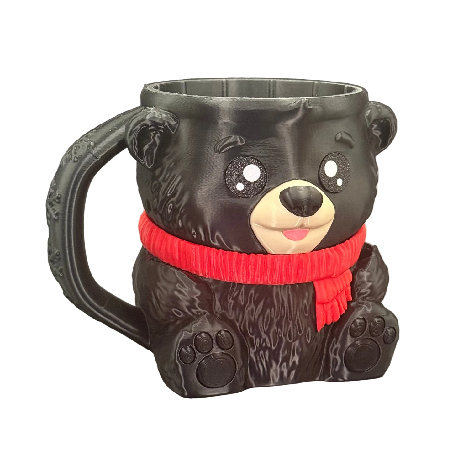 Black bear-shaped mug with a red scarf 